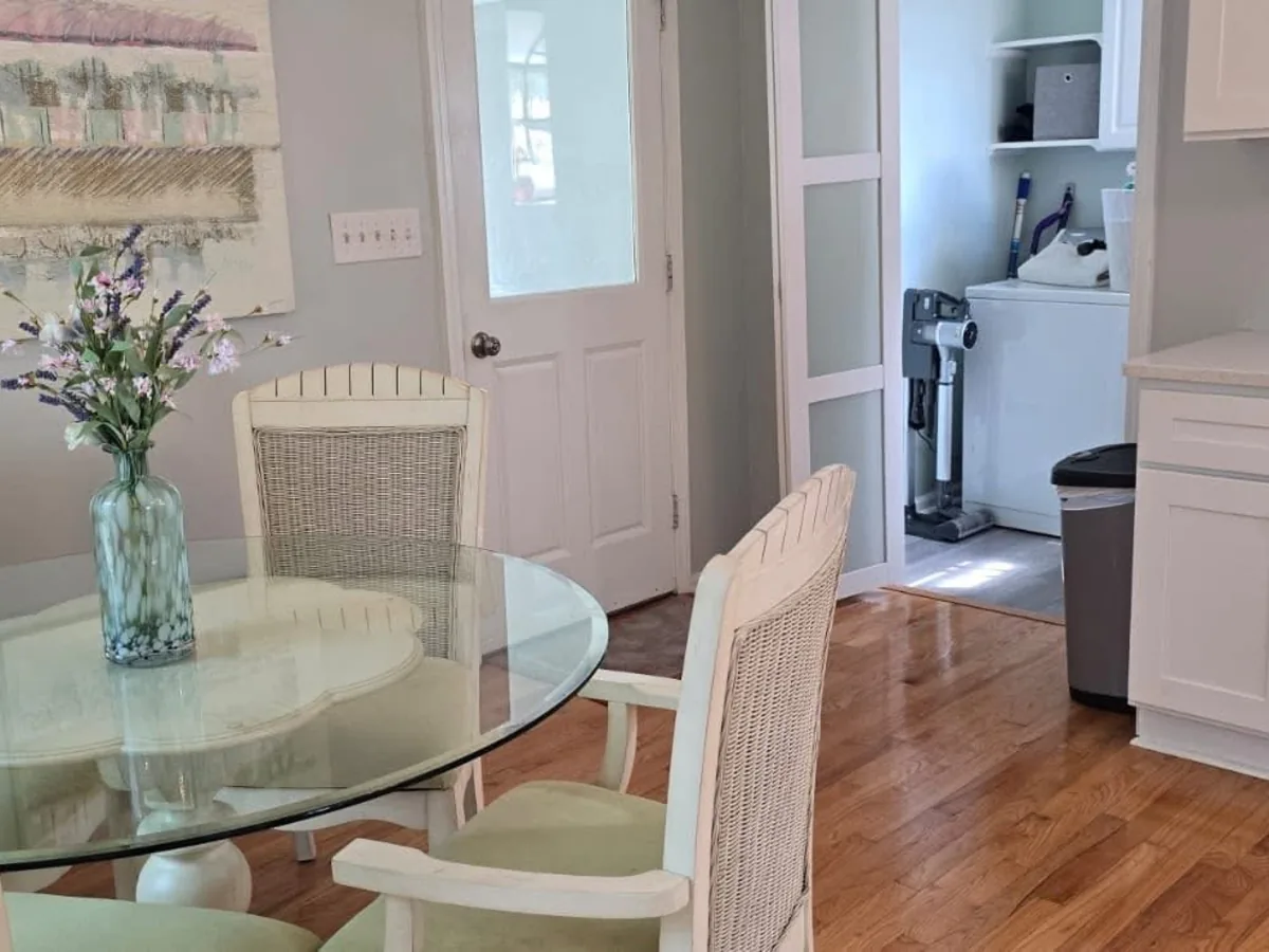 Wiped down glass table, wicker chairs and mopped hardwood floor