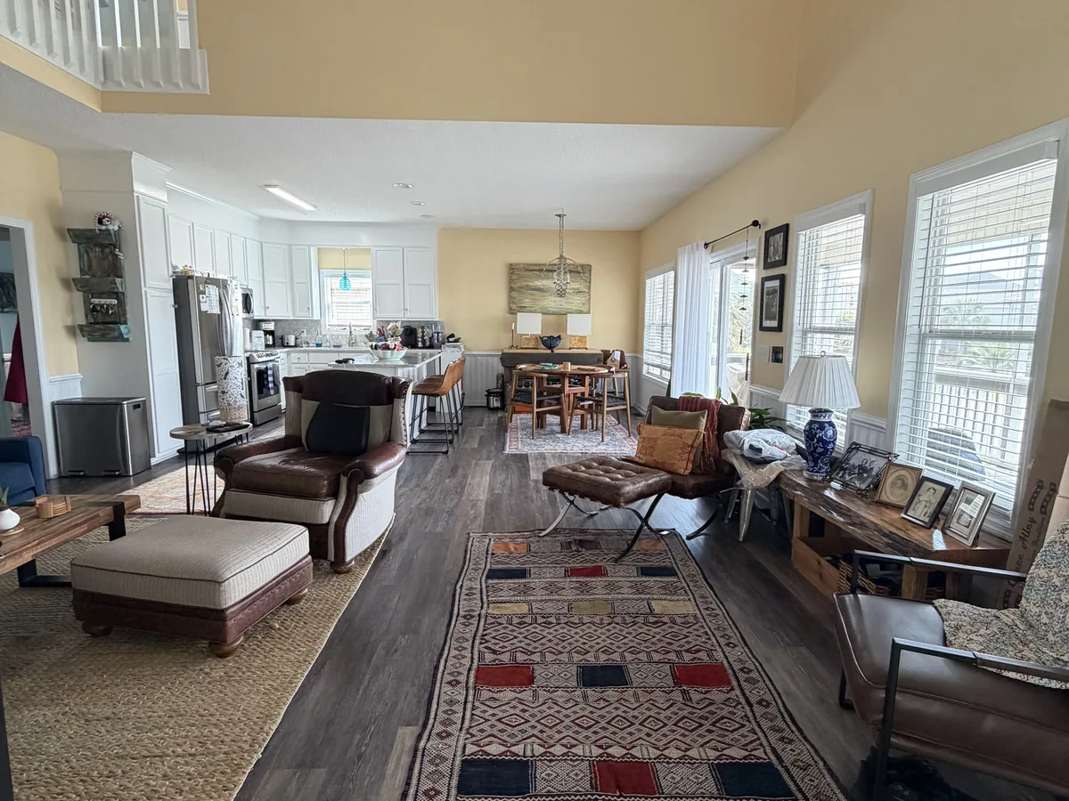 Vacuumed area rug and mopped hardwood floor